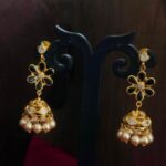 Elegant Black Floral Jhumka Earrings with Pearls – Gold Finish
