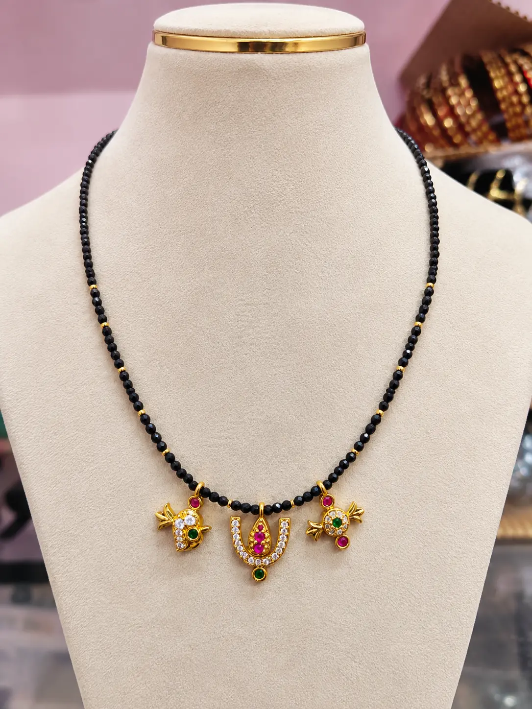 designer-govinda-namalu-pendant-black-beads Govinda Namalu Black Beads Mangalsutra - Image 1