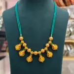 Green Beaded Lakshmi Pendant Necklace – Gold Finish