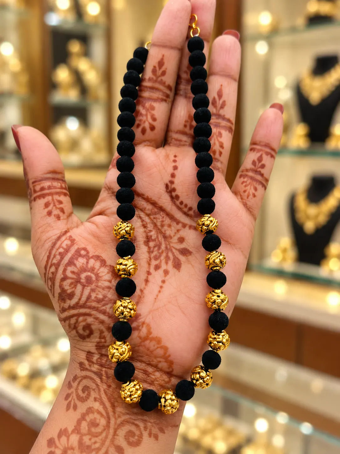 antique-gold-nakshi-ball-black-velvet-bead-mala Traditional Nakshi Ball and Black Velvet Bead Mala Necklace | Premium Antique Gold Finish Single Strand Ethnic Mala for Women - Image 1