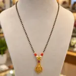 Black Beads Mangalsutra with Lakshmi Gold Tone Pendant