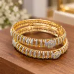 Elegant CZ Diamond Broad Kada Bangles in Traditional Gold Finish