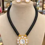 Elegant Uncut Polki Stone Black Thread Pendant Choker Set with Matching Earrings